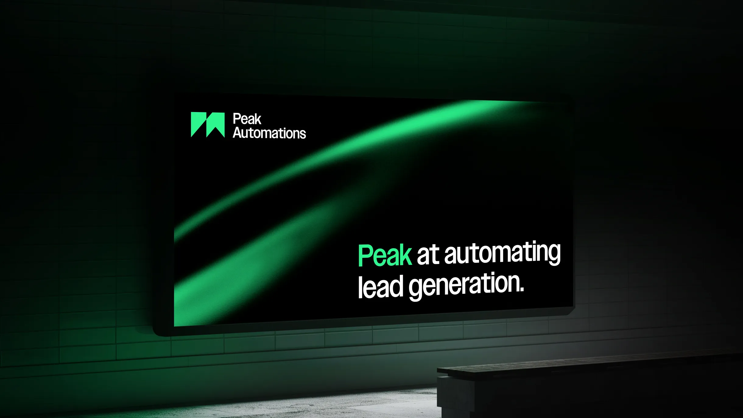 Digital billboard in a dark urban setting displaying Peak Automations logo and the slogan 'Peak at automating lead generation.'