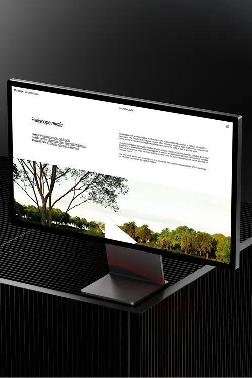 Modern desktop monitor displaying a website about Periscope movie with text and a scenic image of trees against a white background.